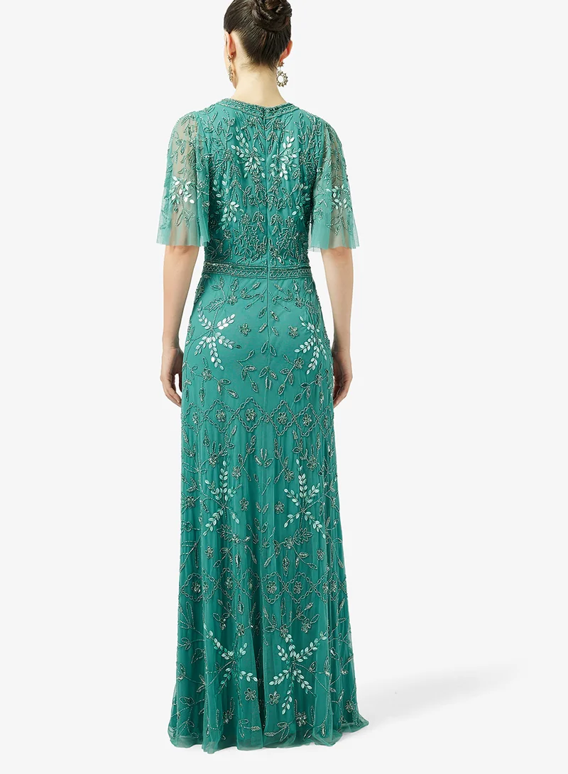 Namshi x Plunge Neck Bead Embellished Evening Gown
